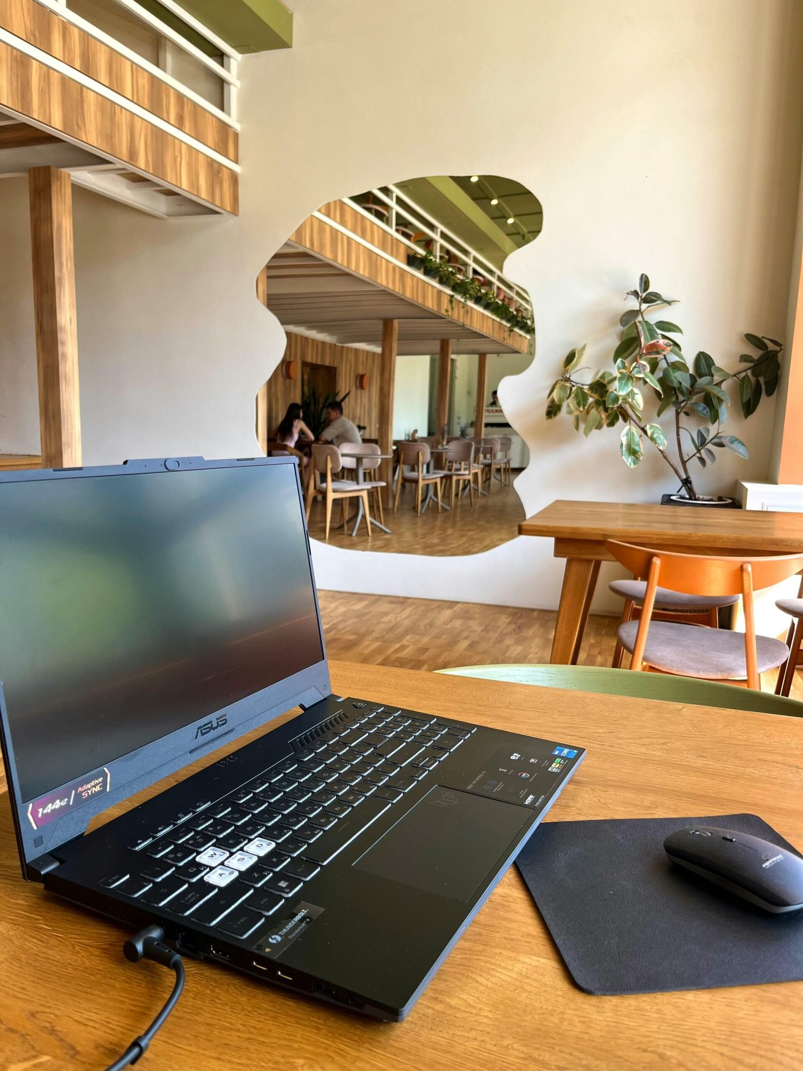 Café Interior with Laptop